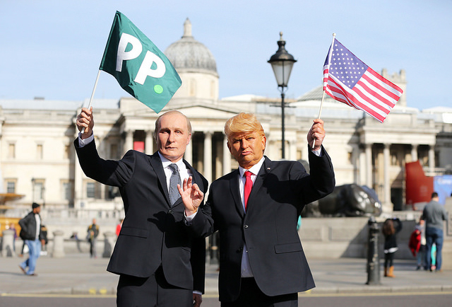 Presidents Vladimir Putin and Donald Trump arrived in London on horseback for Paddy Power, London, UK, 13th March 2017.